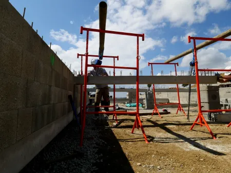 La pose de poutre préfabriquée