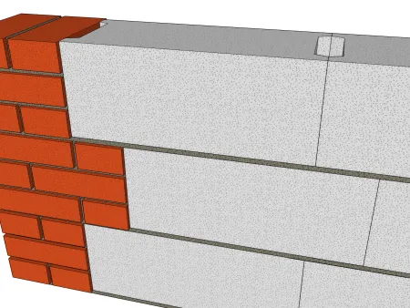 Mur composite (blocs ciment et briques)